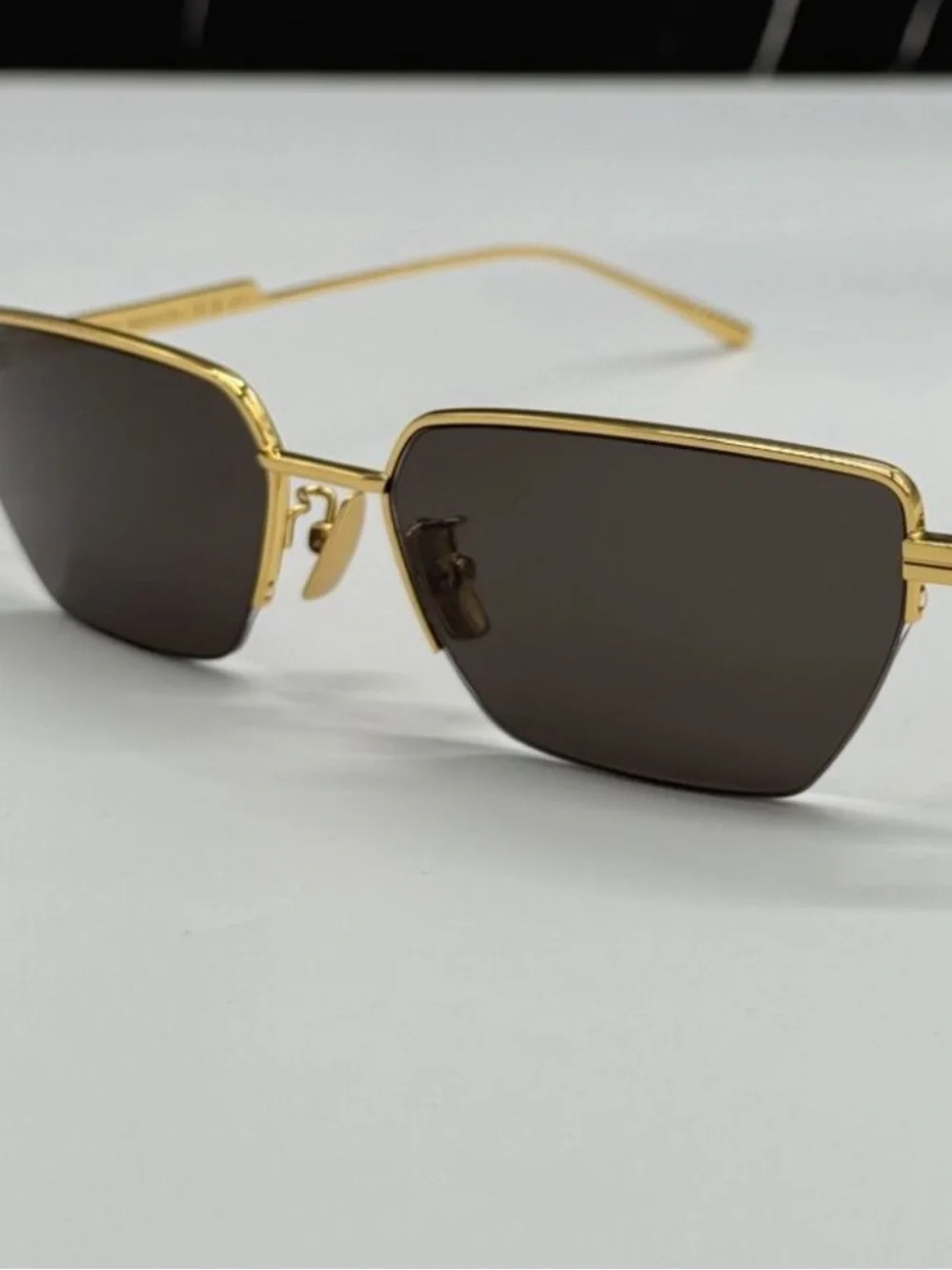 Bottega Veneta Gold Frame Sunglasses with Dark Brown Lenses